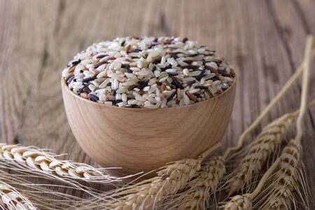 Mixed rice in wooden bowl の写真素材