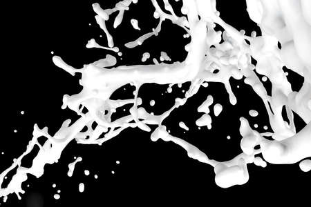 splashing milk, isolated on black backgroundの写真素材