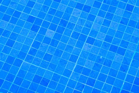 Blue planches in the pool with water outdoor