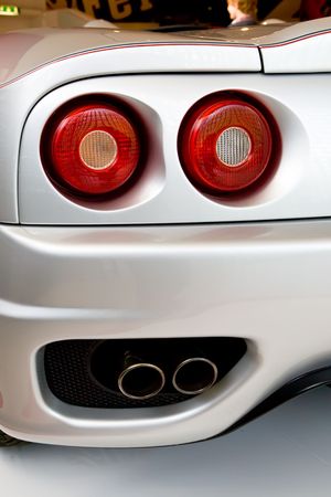 MODENA, ITALY - JULY 09: Rear view of sport car ferrari with red lights Exhibition of Ferrari cars on July 09, 2008 in Modena, Italy. のeditorial素材