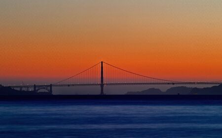 over saturaded Golden Gate bridge at dusk
