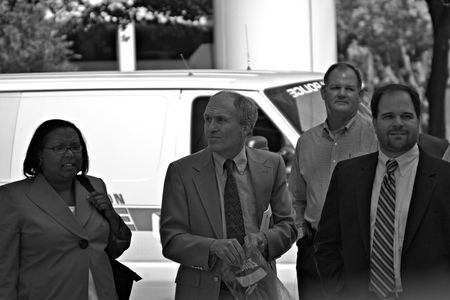 Some smug looking executive from Chevron who came out to see the protestersのeditorial素材