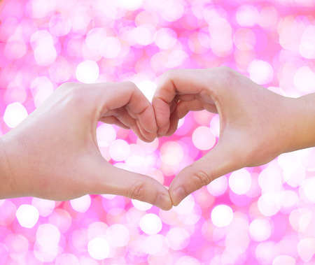 pink illumination heart hand loverの写真素材