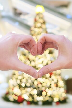 Xmas tree illumination heart hand loverの写真素材