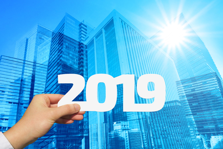 hand holding new year 2019 business backgroundの写真素材