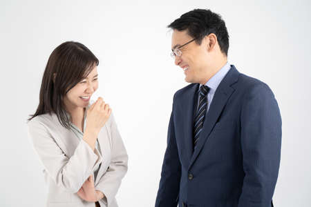 White background of male and female businessmen chatting