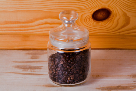 Coffee cup and beans on old kitchen table. Top view with copyspaの写真素材