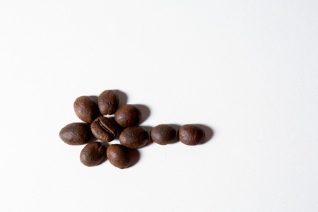 Grain of coffee, beans on a white background. Close-upの写真素材