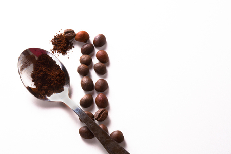 Coffee cup and beans on old kitchen table. Top view with copyspace for your textの写真素材