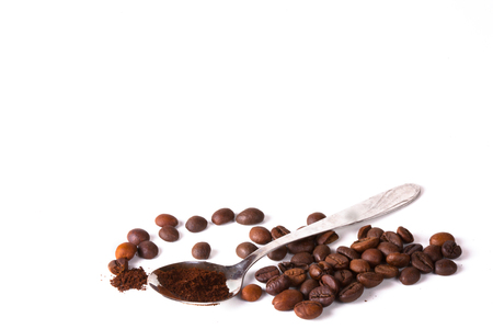 Coffee cup and beans on old kitchen table. Top view with copyspace for your textの写真素材