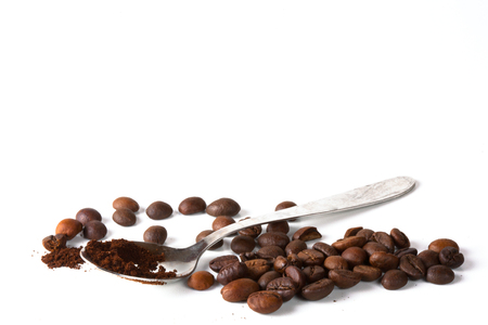 Coffee cup and beans on old kitchen table. Top view with copyspace for your textの写真素材