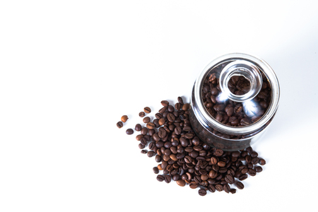 Coffee beans in a jar on old kitchen table. Top view with copyspace for your textの写真素材