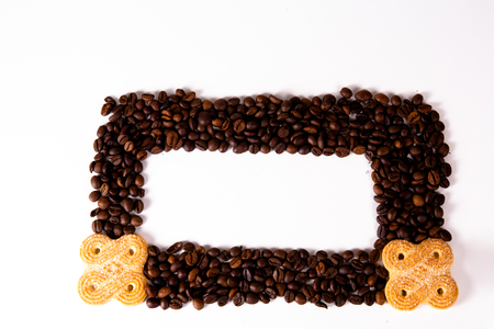 Coffee cup and beans on old kitchen table. Top view with copyspaの写真素材
