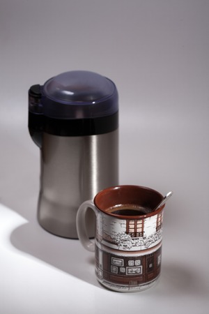 cup of coffee and grinderの写真素材