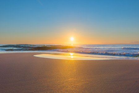 Sunrise on the beachの写真素材
