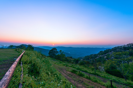 Phu Chi Fah in Chiang Rai,Thailand at sunset.Phu Chi Fah, is a mountain area and national forest park. it is one of the famous tourist attractions of the Thai highlands near Chiang Rai.の写真素材