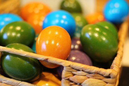 Colored Easter eggs in the basketの写真素材