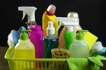 various household chemicals on a black の写真素材