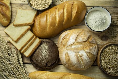 different types of bread on the tableの写真素材