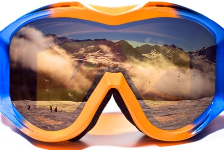 snowboard glasses isolated with reflectionの写真素材