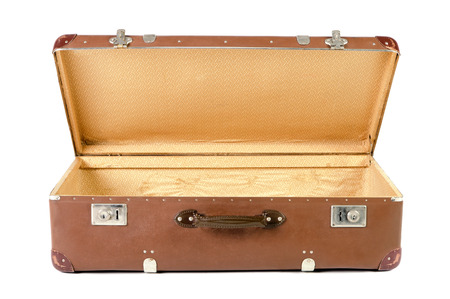 old brown suitcase isolated before white backgroundの写真素材