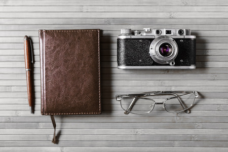 Outfit of traveler, student, teenager, young woman or guy. Essentials for modern young journalist.の写真素材