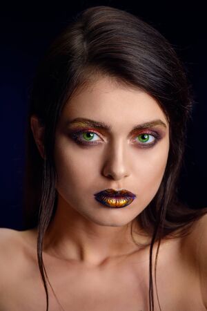 Beauty portrait of a young woman in the studioの写真素材