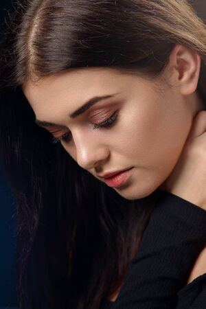 Beauty portrait of a young woman in the studioの写真素材