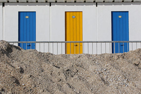 beach changing rooms in winter all closed up in Italy on the Adriatic coast at Christmas timeの写真素材