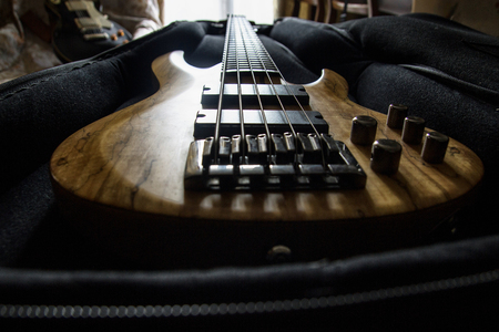 Bass guitar in the case, close upの写真素材