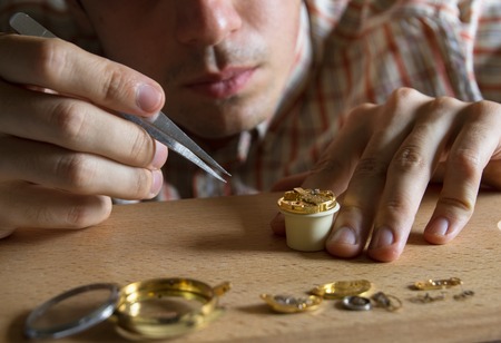 Process of repair of mechanical watches with special toolsの写真素材