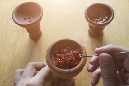 The process of cooking shisha, hookah bowlの写真素材