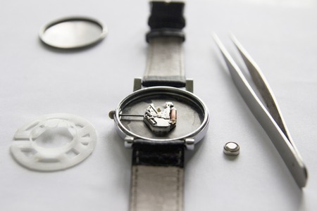 Replacing the battery in a wristwatch, watch repairの写真素材
