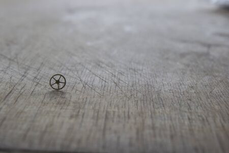 Watchmaker is repairing the mechanical watches in his workshopの写真素材