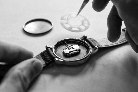 Replacing the battery in a wristwatch, watch repairの写真素材