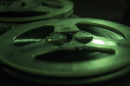 Old tape recorder is playing music, close up