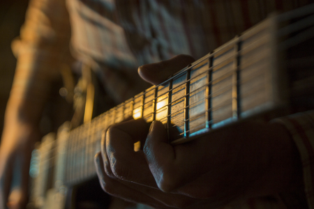 Man playing guitarの写真素材