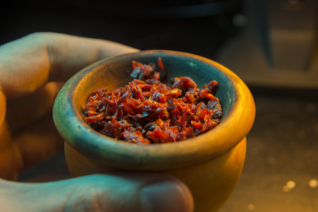 The process of cooking shisha, hookah bowlの写真素材