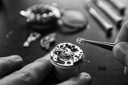Process of installing a part on a mechanical watch, watch repair