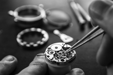Process of installing a part on a mechanical watch, watch repairの写真素材