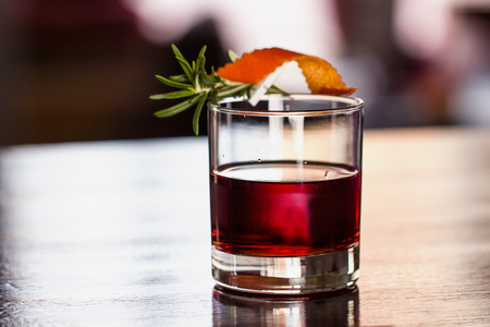 Cocktail with a sprig of rosemary, sloe upの写真素材