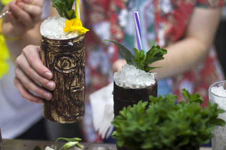 the barman is making cocktails, tropical cocktailsの写真素材
