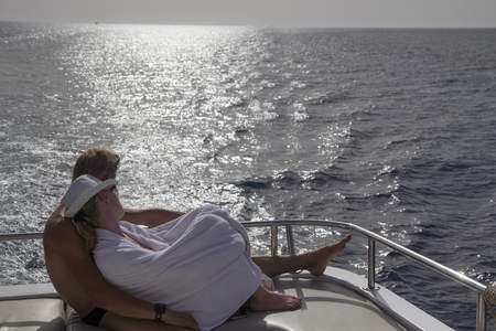 Couple in love, romantic atmosphere on the boatの写真素材