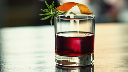 Cocktail with a sprig of rosemary, close upの写真素材