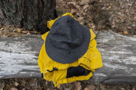 Autamn adventures, grey hat and yellow jacket