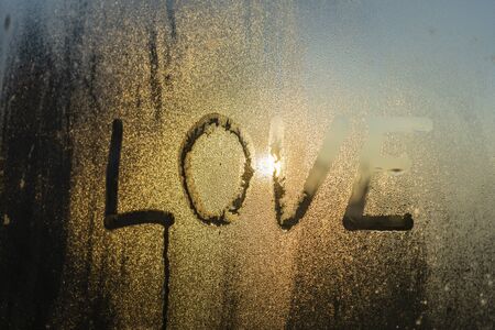 Inscription love on glassの写真素材