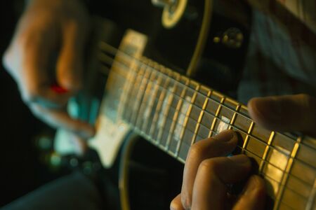 Play the guitar
