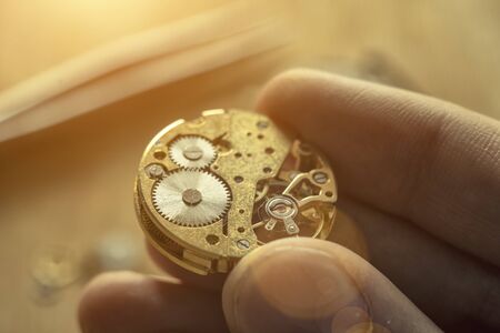 Watchmaker is repairing the wristwatch, mechanical watch