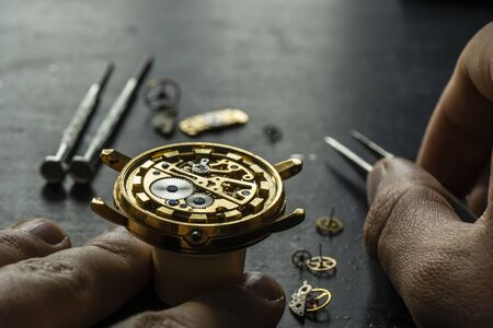 Mechanical watch repair. Watchmaker is repairingの写真素材