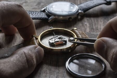Replacing the watch battery, watchmakers workshopの写真素材